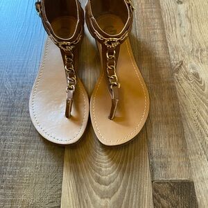G by Guess Brown Leather T-Strap Sandals with Gold Chain Detail